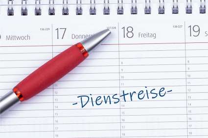Foto: Kalender mit Schrift Dienstreise darauf